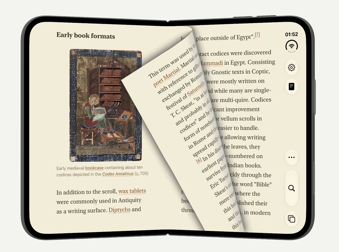 Lens on a half-folded iPhone Duo, turning the page of an article in Reader